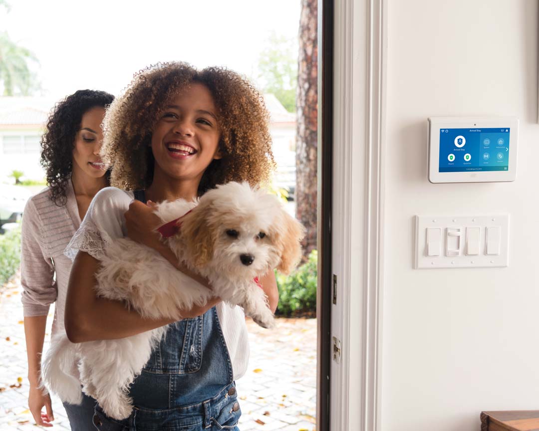 entering-home-with-dog_1080x864 affordable security systems, Lenexa MO